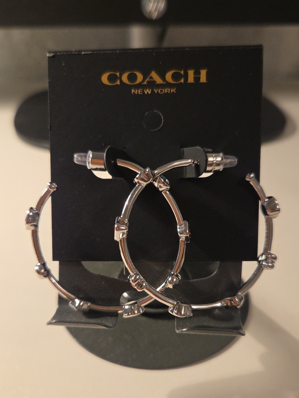 COACH Silver-Tone Knot Detail Hoop Earrings